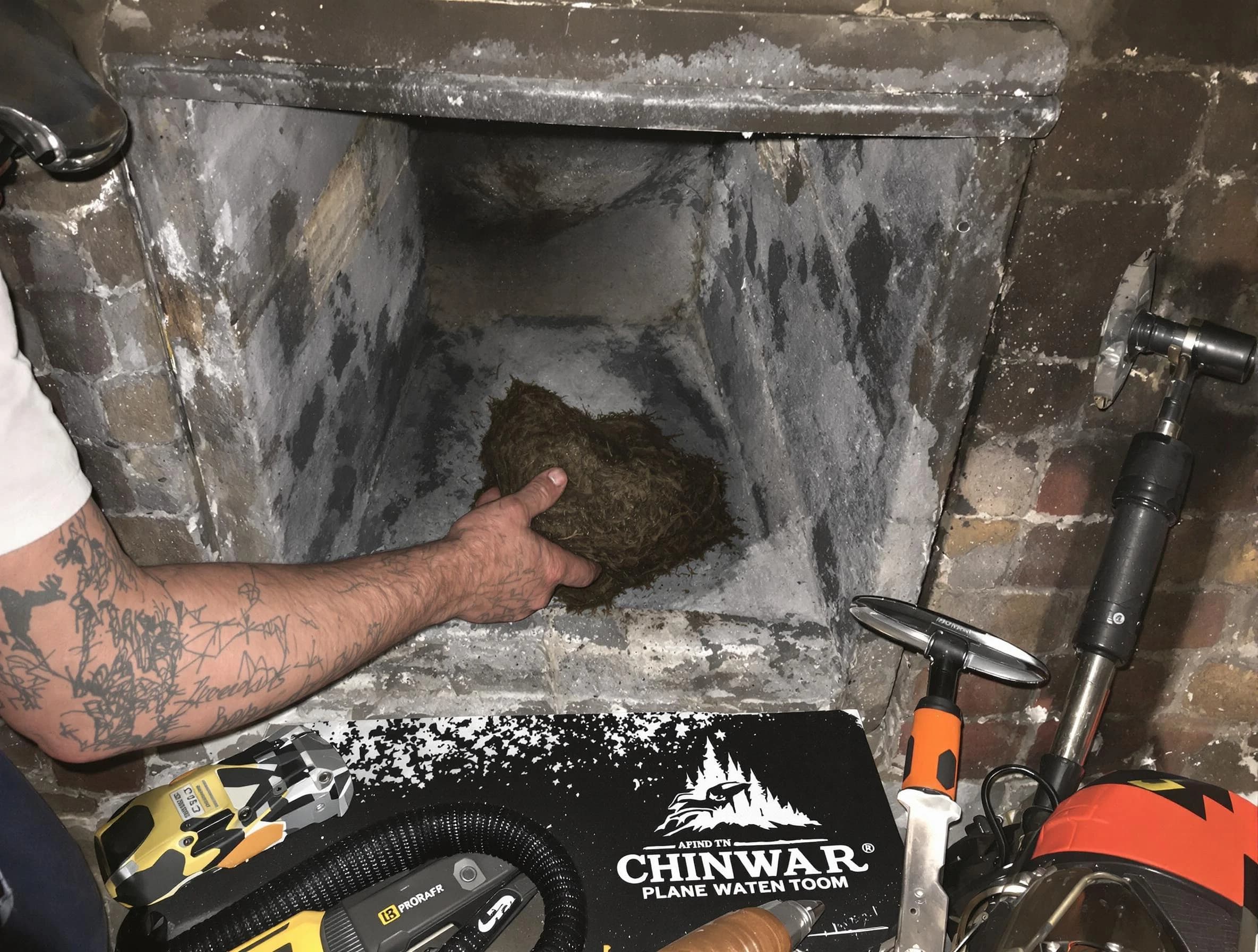 Berkeley Chimney Sweep safely removing debris and screening chimney in Berkeley, NJ